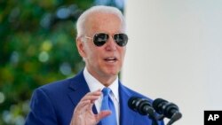 FILE - President Joe Biden speaks at the White House in Washington.