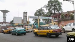 FILE: Traffic outside the entrance to the Yaounde General Hospital in Yaounde on March 6, 2020.
