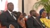 COTE D'IVOIRE - IVORY COAST - Ivorian President Alassane Ouattara (L) and Vice President Tiemoko Meyliet Kone 