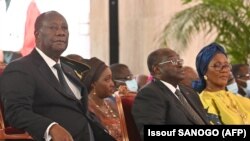 COTE D'IVOIRE - IVORY COAST - Ivorian President Alassane Ouattara (L) and Vice President Tiemoko Meyliet Kone 