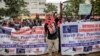 FILE - Protesters chant slogans while marching during a protest to demand peaceful elections and justice for victims of post-election violence in Nairobi, Kenya on June 23, 2022.