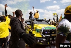 Kenya's Deputy President and presidential candidate William Ruto arrives to his final election rally ahead of the August 9 general elections at the Nyayo National Stadium in Nairobi, Kenya, Aug. 6, 2022.