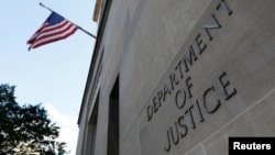 FILE - The headquarters of the United States Department of Justice in Washington, Aug. 29, 2020. 