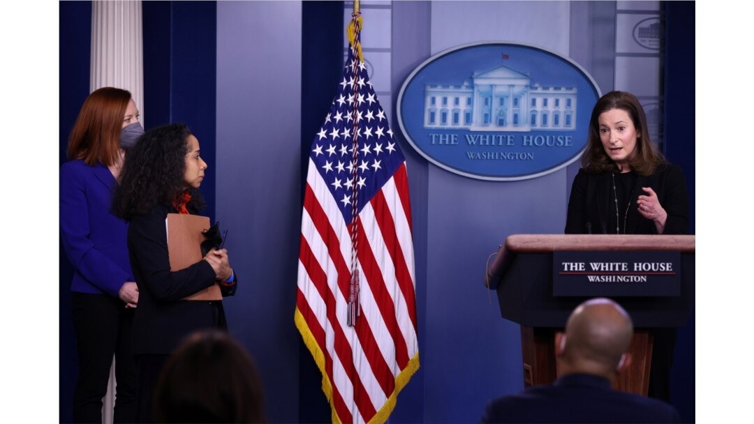 White House Press Secretary Jen Psaki and Chief of Staff to the First Lady Julissa Reynoso watch as Executive Director of the Gender Policy Council Jennifer Klein delivers remarks during a daily press briefing at the White House, March 8, 2021.