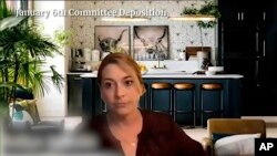 FILE - This image released by the House Select Committee investigating the Jan. 6 attack on the U.S. Capitol shows Kellye SoRelle, general counsel for the anti-government group Oath Keepers, during a deposition displayed at a hearing by the committee on J
