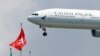 疫情导致需求下降 国泰航空要求员工休三周无薪假 