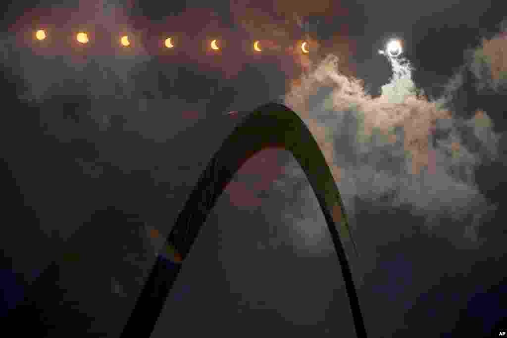 In this multiple exposure photograph, the phases of a partial solar eclipse are seen over the Gateway Arch in St. Louis, Missouri, Aug. 21, 2017. The Gateway Arch was just a few miles outside of the path of totality.