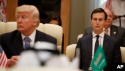 FILE - White House senior adviser Jared Kushner, right, looks on during a meeting between U.S. President Donald Trump, left, and leaders at the Gulf Cooperation Council Summit, at the King Abdulaziz Conference Center, in Riyadh, Saudi Arabia, May 21, 2017.