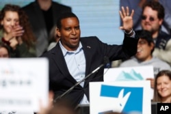 FILE - Joe Neguse, seen here at a rally with young voters on the campus of the University of Colorado, Oct. 24, 2018, was among the U.S. lawmakers who visited Eritrea.