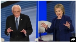 Democratic presidential candidate Senator Bernie Sanders, left, and former Secretary of State Hillary Clinton participate in town hall event in Derry, New Hampshire, Feb. 3, 2016.
