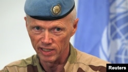 Norwegian Major General Robert Mood, chief of the United Nations Supervision Mission in Syria speaks during a news conference in Damascus on July 5, 2012. 
