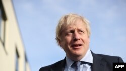 Britain's Prime Minister Boris Johnson visits Chulmleigh College while campaigning for the general election in Chulmleigh, Devon, southwest England, Nov. 28, 2019.