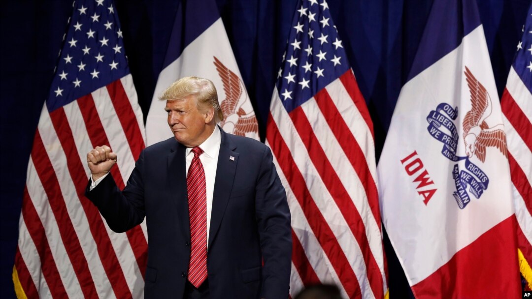 President Donald Trump acknowledges supporters after speaking at the Republican Party of Iowa's America First Dinner, June 11, 2019, in West Des Moines. 