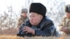 North Korean leader Kim Jong Un supervises what state media KCNA says is a test launch of a missile over the sea off the west coast of the Korean peninsula, Feb. 26, 2025, in this photo released by North Korea's official Korean Central News Agency.