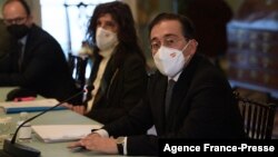 Spanish Foreign Minister Jose Manuel Albares, right, speaks during a meeting with US Secretary of State Tony Blinken (out of frame) at the State Department in Washington, on Jan. 18, 2022.