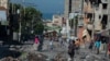 Residents evacuate Poste Marchands in Port-au-Prince, Haiti on December 9, 2024, after gangs took control of the region on December 7.