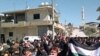 Syria Aid Effort Widens as Government Attacks Continue