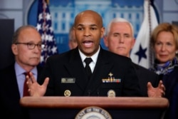 Kepala Kesehatan Masyarakat AS Jerome Adams dalam konferensi pers di Gedung Putih, di Washington, tentang virus corona.