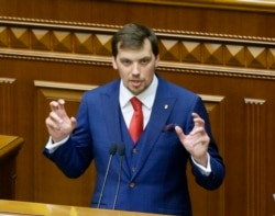Ukraine's newly elected Prime Minister Oleksiy Honcharuk speaks during a parliament session in Kyiv, Ukraine, Aug. 29, 2019.Honcharuk speaks during parliament session in Kyiv, Ukraine, Aug. 29, 2019.