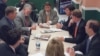 FILE - Lobbyist Brian Ballard, center meets with other lobbyists, from center to left, Mac Stipanovich, Gene McGee Joe McCann, Courtney Bense, Greg Turbeville, Matt Bryan, and Clark Smith in the Capitol cafeteria before the legislative session begins, Apr