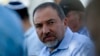 FILE - Israel's Foreign Minister Avigdor Lieberman meets with local residents in Mitzpe Gadot, Northern Israel, overlooking the Golan Heights, Nov. 11, 2010.