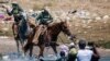 Gubernur Texas Beri Wewenang Pasukan Negara Bagian Kembalikan Migran ke Perbatasan 