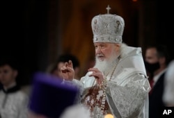 FILE - Russian Orthodox Church Patriarch Kirill conducts the Easter service in the Christ the Savior Cathedral in Moscow, April 24, 2022.