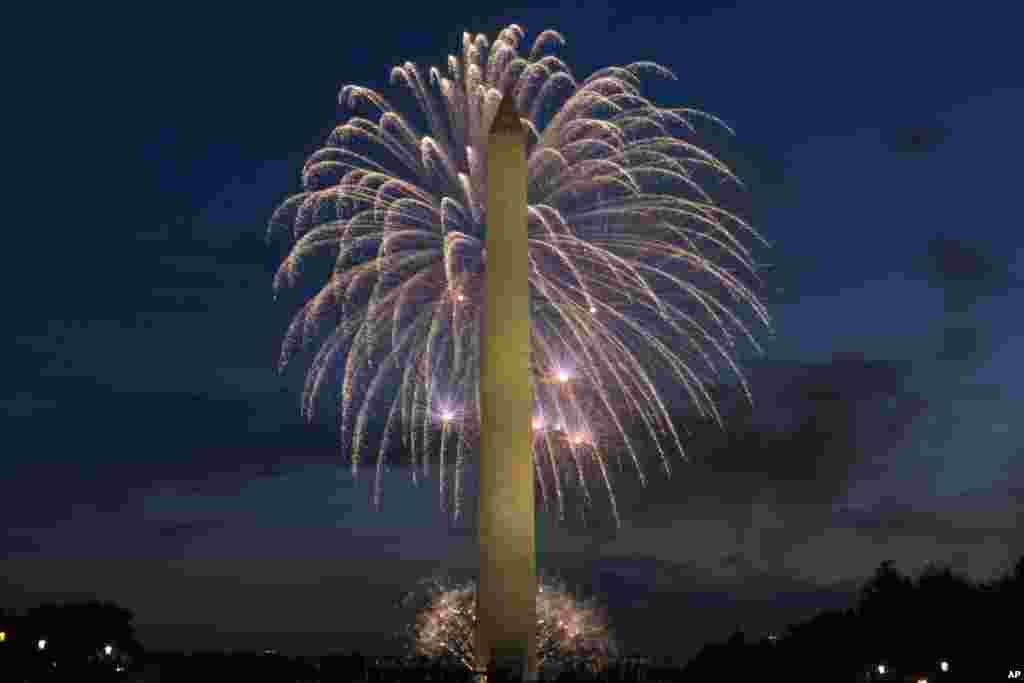 Fireworks explode over the Washington Monument at the National Mall during the Independence Day celebrations in Washington, July 4, 2022.