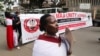 Members of the Maasai ethnic community in Kenya march during a protest against the eviction of their compatriots from their ancestral land in Tanzania, Nairobi, Kenya, June 17, 2022.