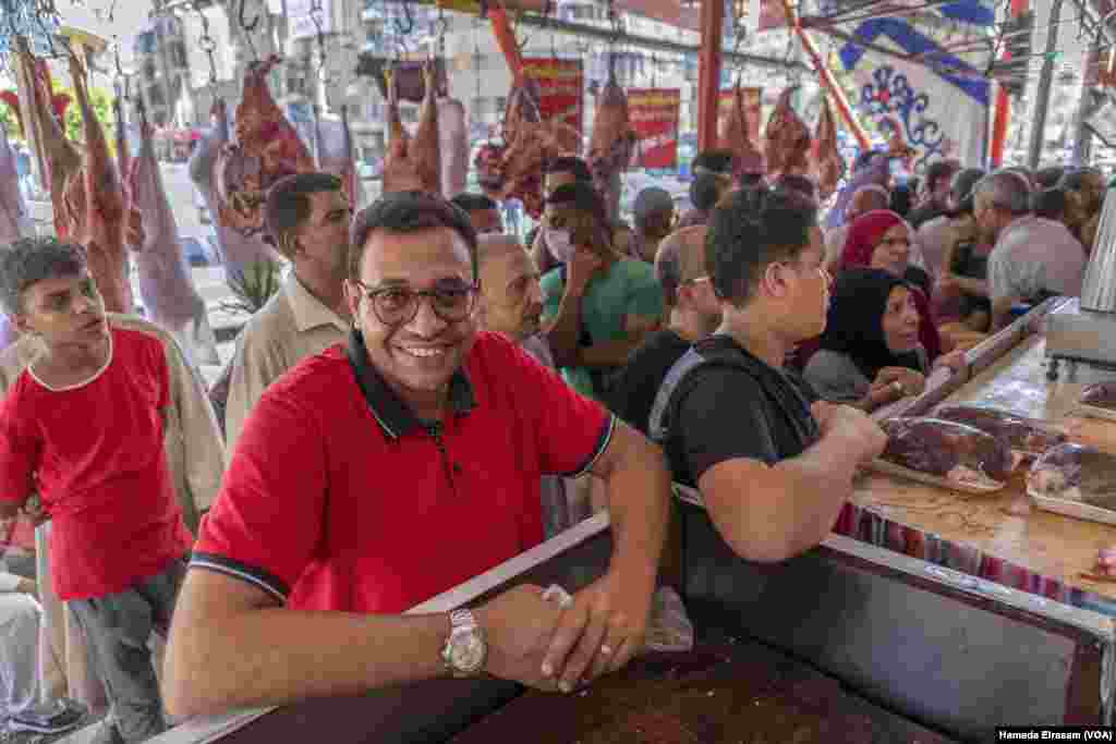 In accordance with the Islamic tradition of slaughtering livestock during the four-day Eid al-Adha festival, Sayyed, a father of three, says, “I’m buying meat to distribute among families who can’t afford it.” Cairo, July 5, 2022. (Hamada Elrasam/VOA)