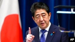 资料照片：日本前首相安倍晋三。