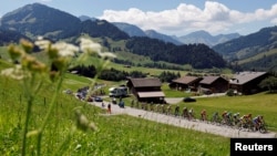 General view of the Tour de France peloton in action during stage 9, Aigle to Chatel les Portes du Soleil, Switzerland, July 10, 2022.