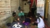 Tim dokter dan relawan ACT-MRI Duri sedang memberikan layanan kesehatan kepada salah satu lansia di Jakarta Barat. (Courtesy ACTNews/Aditya Perdana Putra)