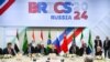 FILE - Para pejabat, termasuk Presiden China Xi Jinping, Presiden Rusia Vladimir Putin, dan Perdana Menteri India Narendra Modi, menghadiri KTT BRICS di Kazan, Rusia, 23 Oktober 2024. (Alexei Danichev/BRICS-RUSSIA2024.RU Host Photo Agency via REUTERS)