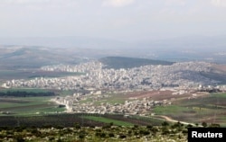 A general view shows the Kurdish city of Afrin, in Aleppo's countryside, March 18, 2015.