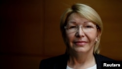 FILE - Venezuela's dismissed chief prosecutor Luisa Ortega Diaz poses for a picture during an interview with Reuters in Caracas, Aug. 10, 2017.