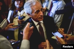 Senator Bob Corker speaks to reporters at the US Capitol in Washington, April 21, 2015.