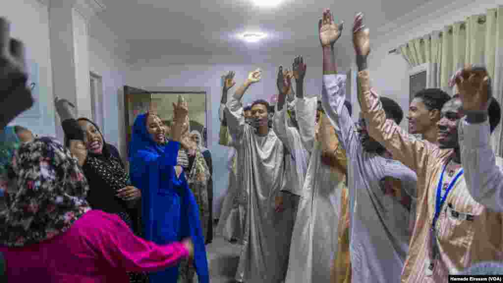 At the opening party for a law office in Cairo on Nov. 22, 2024, refugees from Sudan unite with Cairo’s wider Sudanese community. Some 4 million Sudanese nationals lived in Egypt before Sudan’s war erupted and forced millions to flee.