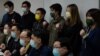 Pro-democratic party members shout slogans in response to the mass arrests during a press conference in Hong Kong Jan. 6, 2021. 