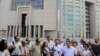 Turkish Journalist Detained Over Tweet, Others Go on Trial