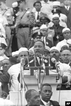 FILE - Martin Luther King Jr., head of the Southern Christian Leadership Conference, addresses marchers during his "I Have a Dream" speech at the Lincoln Memorial in Washington, Aug. 28, 1963.