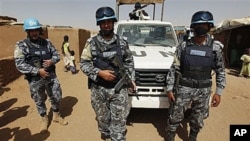Jordanian peacekeepers of the United Nations African Mission In Darfur, UNAMID, patrol the refugee camp of Abou Shouk at the outskirts of the Darfur town of el Fasher, Sudan (File Photo)
