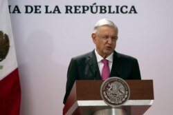 FILE - Mexican President Andres Manuel Lopez Obrador speaks at the National Palace in Mexico City, July 1, 2021.