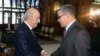 A handout picture released by the official Algeria Press Service (APS) shows Algerian President Abdelaziz Tebboune (L) receiving newly-appointed Prime Minister Abdelaziz Djerad in the capital Algiers, Dec. 28, 2019.