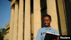 FILE - Second-year civil engineering student Nkululeko Simelane poses for a picture at Wits University in Johannesburg, April 22, 2014.