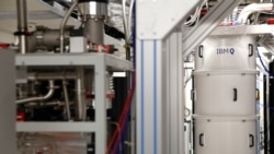 This Feb. 27, 2018, photo shows a quantum computer, encased in a refrigerator that keeps the temperature close to zero kelvin in the quantum computing lab at the IBM Thomas J. Watson Research Center in Yorktown Heights, N.Y.
