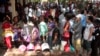 Cambodian residents line up to vote in local elections at a polling station in Chak Angre Leu on the outskirts of Phnom Penh, Cambodia, June 4, 2017. 
