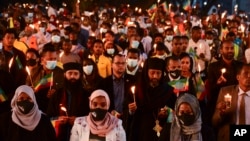 Ethiopians commemorate federal soldiers killed by forces loyal to the Tigray People's Liberation Front (TPLF) at the start of the conflict one year ago at a candlelit event in Addis Ababa, Ethiopia, Nov. 3, 2021.