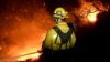 Firefighters battle the Thomas fire in the hills and canyons outside Montecito, California, Dec. 16, 2017. 