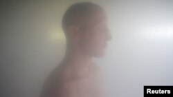 Turkish-German patient Cengiz takes a steam bath two days before his ordination as a Buddhist monk, at Wat Thamkrabok monastery in Saraburi province, Thailand, March 28, 2017.